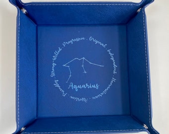 Astrological signs leatherette caddy / catch all/ capon catch / key holder. Can be laser engraved with any astrological sign