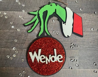 Grinch ornament personalized with red glitter ornament grinch hand holding ornament can be done with name or 2023