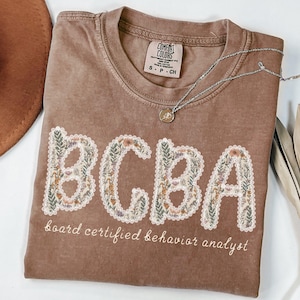 BCBA Shirt, Comfort Colors Floral Board Certified Behavior Analyst Shirt, Future BCBA Gifts, Aba Therapy Shirt, Behavior Therapist Tshirt