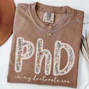 PhD Graduation Gifts for Her, Comfort Colors Floral In My Doctorate Era PhD Shirt, Gifts for PhD Graduates, PhD Medical Student Gift