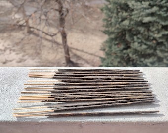 Incienso en barra de oud enrollado a mano