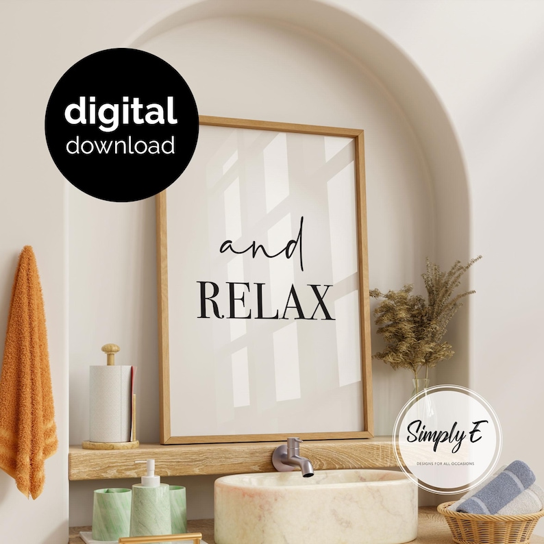 May include: A vertical rectangular framed wall art piece with a light background and the black text "and RELAX" centered. The frame is light wood. A black circular badge in the upper left corner reads "digital download" in white text.