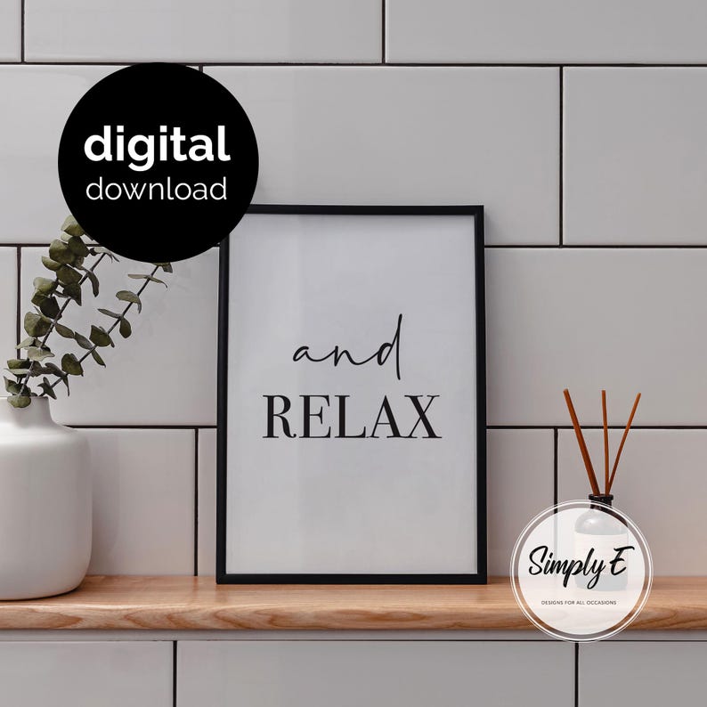 May include: A black framed wall art print featuring the text and RELAX in a combination of script and serif fonts on a white background. A black circular badge in the upper left corner contains the white text digital download.
