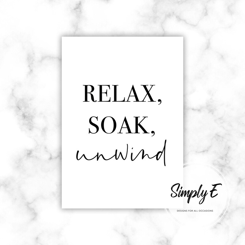 May include: White rectangular print with the words "RELAX, SOAK, unwind" in black script. The print also includes the text "Simply E" and "DESIGNS FOR ALL OCCASIONS" in black. The background is a marble pattern.