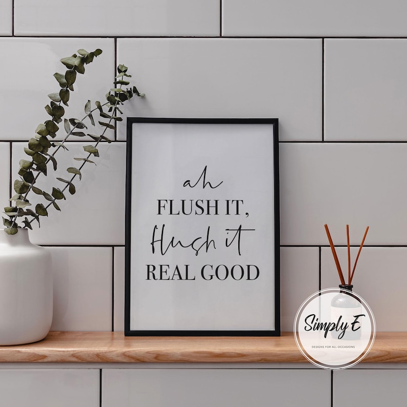 May include: A white ceramic mug with a black handle and the text "But First, Coffee" in a bold, black font. The mug is set against a blurred background, suggesting a cozy setting.