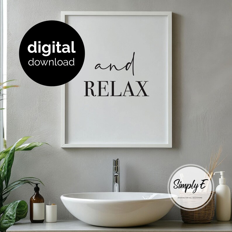 May include: A white framed wall art print featuring the black text and RELAX on a white background. A black circular badge in the upper left corner contains the white text digital download. The print is displayed above a white vessel sink.