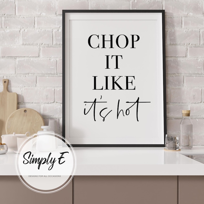May include: Black and white kitchen wall art print with the text "Chop it like it's hot" in a black frame.