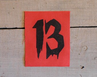 13 en Red Patch