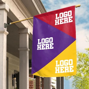May include: A rectangular flag with a red, purple, and yellow color scheme. The flag is divided diagonally, with the top section red, the middle purple, and the bottom yellow. The words "LOGO HERE" are printed in white on each section.