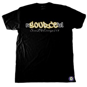 May include: Black t-shirt with the word "resourceful" in yellow and white graffiti-style lettering. Below the word is the text "Soul L'Vereign 218" in white script. A small blue and yellow eye symbol is at the bottom right.