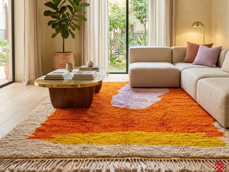 Close up of orange Moroccan wool rug showing thick plush fibers and handcrafted texture details