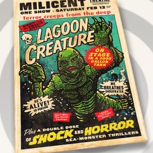 May include: A vintage movie poster advertising a monster movie called "Lagoon Creature". The poster features a green, scaly creature with sharp teeth and claws, standing in a large tank of water. The text on the poster reads "He's Alive! In Person" and "On Stage in a 5000 Gallon Tank".