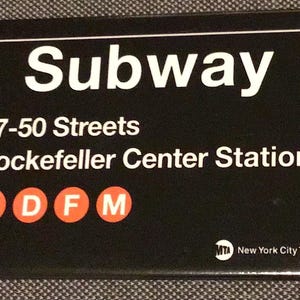 Rockefeller Center Replica Subway Sign on a 2x3 Refrigerator Magnet with Glossy Finish and Metal Construction.A Gift For Him or Her.