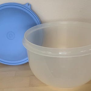 May include: A set of three ceramic mugs with a speckled, matte finish. The mugs are in shades of cream, light gray, and dark gray. Each mug has a simple, minimalist design, perfect for coffee or tea.