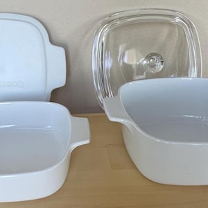 Vintage 4-piece Set Corning Ware Plain White 1.5 and 1 Quart Square Casserole Dishes, Pyrex Lid P7C, and Rubber Lid A-1-PC
