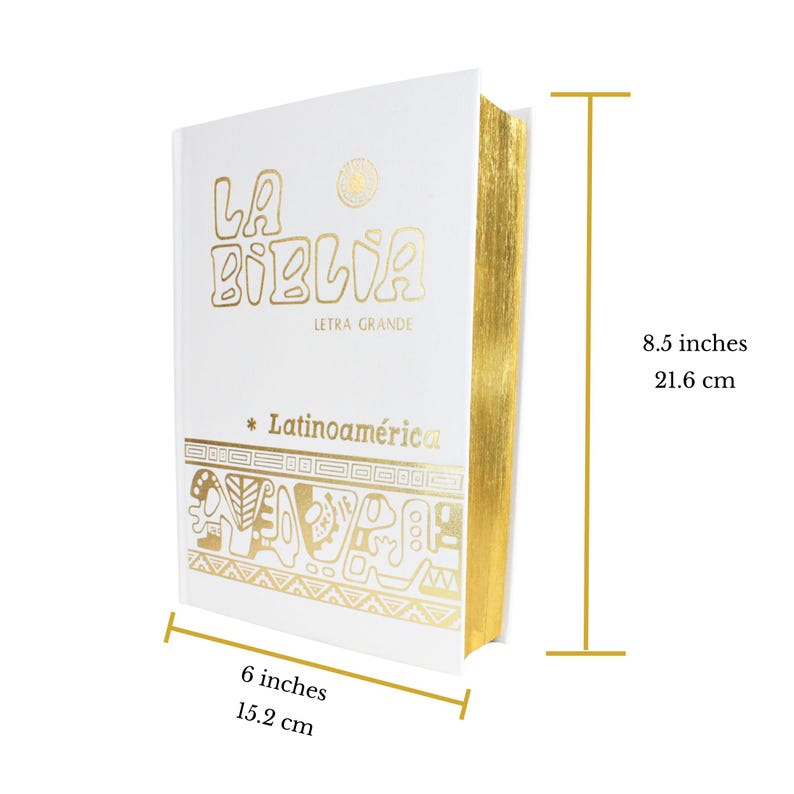May include: White hardcover book with gold lettering and a gold border. The title is "La Biblia Letra Grande" and the subtitle is "Latinoam&eacute;rica". The book measures 6 inches by 8.5 inches.