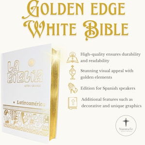 May include: A white hardcover Bible with gold accents and the title "La Biblia" in gold lettering. The book has a gold edge and features decorative gold designs. The text "Nuestra Fe" is also visible in gold lettering.