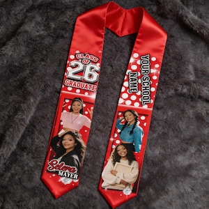 May include: Red graduation sash with the text "Class of 26 Graduate" and "Your School Name". The sash features photos of a graduate and white polka dots. The name "Selena Mayer" is also printed on the sash.
