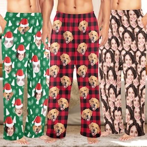 May include: Three pairs of lounge pants featuring custom prints: green with white snowflakes, trees, and dog faces in Santa hats; red and black buffalo plaid with golden retriever faces; and a collage of repeating human face portraits.