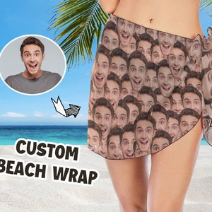 May include: A custom beach wrap with a pattern of many faces. The wrap is tied around the waist and has a long, flowing piece of fabric that drapes down the side. The wrap is made of a lightweight, breathable fabric that is perfect for hot weather.