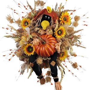 wreath with crow, sunflowers and wheat