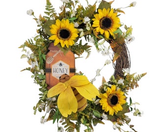 Corona de bienvenida de girasoles con abeja: decoración para la puerta principal