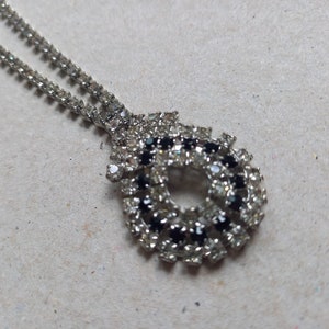 Vintage crystal pendant-style necklace with clear and black gemstones