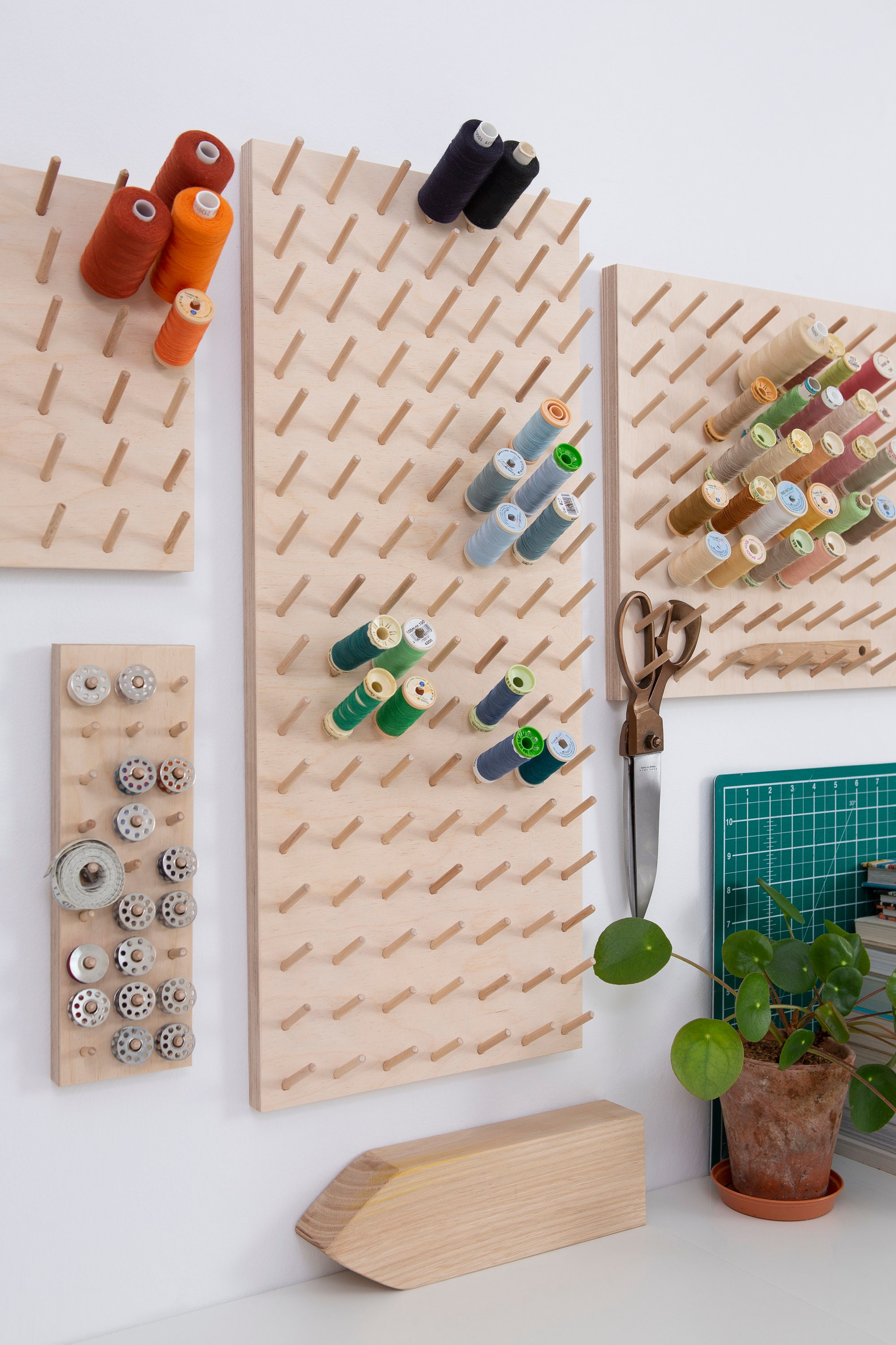 Block Design Wooden Peg Board Displays Your Favorite Items on the Wall