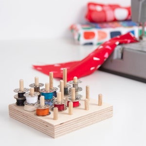 Sewing bobbin spool organiser thread holder for craft table