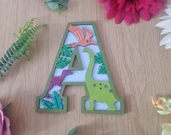 Personalised Dinosaur Letter: Jurassic Theme Wooden Name Sign