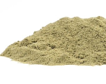 May include: A pile of light green powder, likely a dried herb or spice, on a white background.