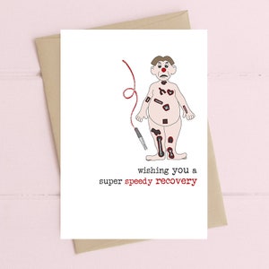 May include: A humorous get well soon card featuring a cartoon illustration of a person with bandages and the text "wishing you a super speedy recovery".
