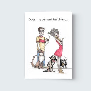 May include: A greeting card with a cartoon illustration of two people and three dogs. The card reads "Dogs may be man's best friend..."