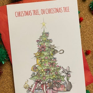 May include: A Christmas card featuring a green Christmas tree decorated with ornaments, candy canes, and bows.  Cats are climbing the tree and playing with the decorations. The card reads "Christmas Tree, Oh Christmas Tree".