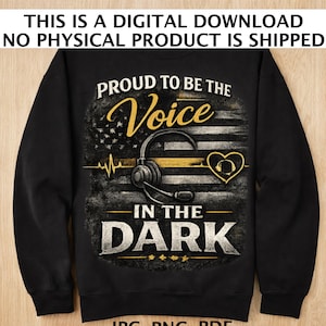 May include: Black sweatshirt with the text "PROUD TO BE THE Voice IN THE DARK." The design includes a headset, a heartbeat line, and a heart-shaped design. The background features an American flag design.