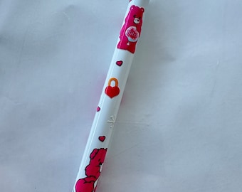 Metal pen with vinyl