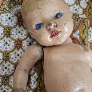 Antique early 20th century composition doll