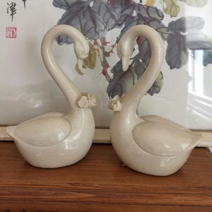 White swan figurine set