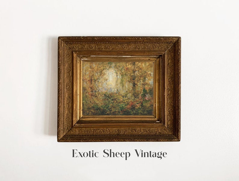 May include: A vintage framed painting of a forest scene with a golden frame. The painting depicts a forest with trees and foliage in shades of green, brown, and yellow. The frame has a decorative design with intricate details.