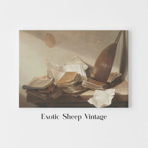 May include: A still life painting featuring a collection of old books and a lute, all arranged on a wooden table. The books are stacked and scattered, with some pages open and others closed. The lute is lying on its side, with its strings visible. The painting is done in a warm, earthy palette, with shades of brown, beige, and cream.