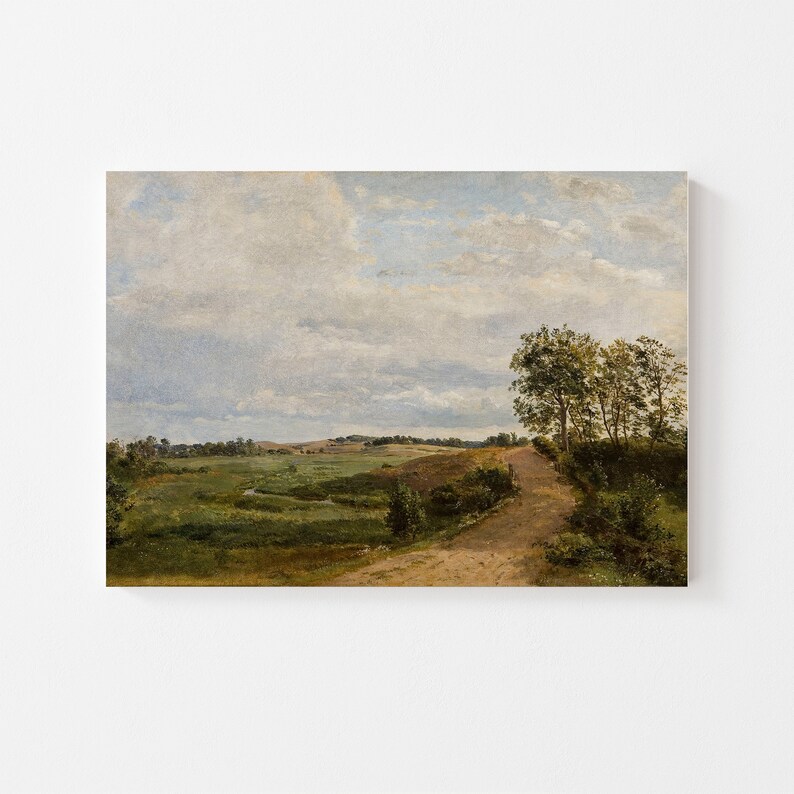 May include: A painting of a rural landscape with a dirt road leading through a field of green grass and trees. The sky is cloudy and blue.