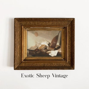 May include: A framed vintage still life painting of a lute, books, and papers in a gold frame.