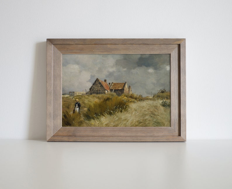 May include: A framed oil painting depicting a rural landscape with a small cottage in the distance. The scene is set in a field of tall grass with a single figure walking in the foreground. The sky is overcast with dark clouds.