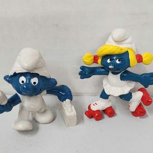 Vintage First Aid Smurf And Skating Smurfette Lot Of 2