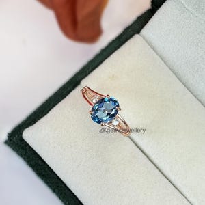 Swiss Blue Topaz Ring: Oval Sterling Silver, December Birthstone