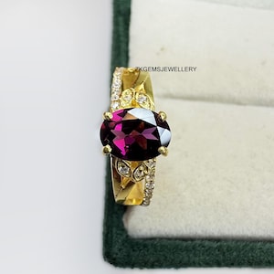 Rhodolite Garnet Ring: Oval Cut Sterling Silver Cluster - January Birthstone