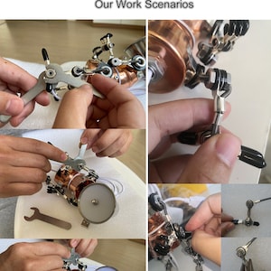 May include: A close-up of a copper-colored robot with multiple articulated arms and black rubber tips. The robot is being assembled by hand using a wrench and other tools. The robot has a white light on the front and a white wire connected to it. The image shows the process of assembling a robot.