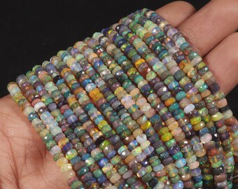 Etiopskie czarne koraliki z opalu okrągłego: fasetowany opal ognisty AAA+ (3-6 mm)