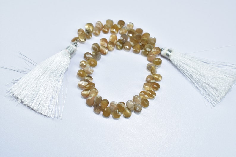 5.75X7.75MM Natural Golden Shine Moonstone Faceted Pear Shape Gemstone Briolette Beads 8 Inch Strand 5X7MM Moonstone Pear Faceted Beads