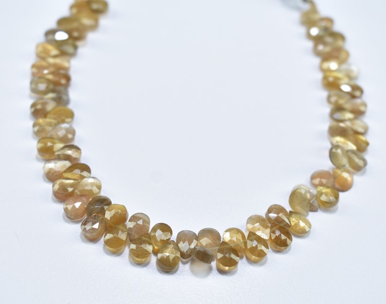 5.75X7.75MM Natural Golden Shine Moonstone Faceted Pear Shape Gemstone Briolette Beads 8 Inch Strand 5X7MM Moonstone Pear Faceted Beads